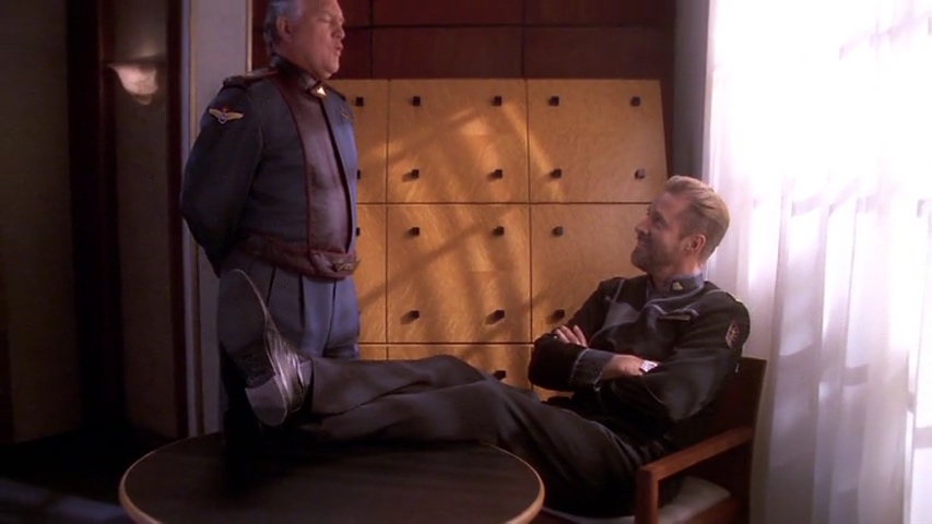 Sheridan sits smugly with his feet up as the general learns Sheridan's been made President of the IA.